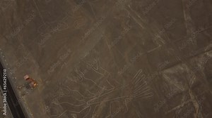 Nazca lines and desert stretching to the horizon of the Nazca Lines geoglyphs made in the soil of the Nazca Desert Aerial video.