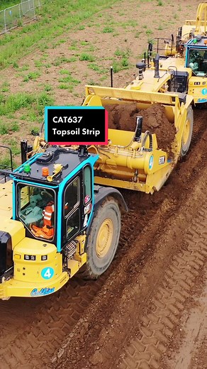 CAT 637 Scrapers in Action: Topsoil Stripping Video