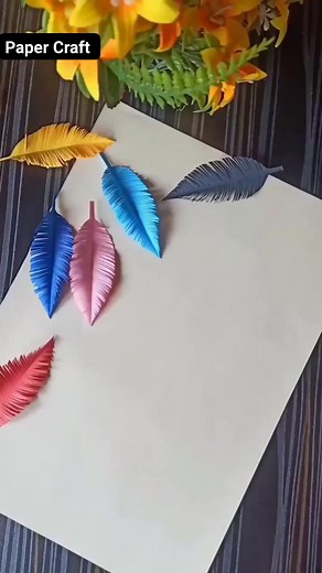 2.6K views · 37 reactions | Diy Paper Feathers #reelsfb #fypシ゚ #wallhanging #fbreels #walldecor #homedecoration #viralreelsfb #papercrafts #foryoupage #fbreelsfypシ゚viral Paper Craft | SIZU | Facebook