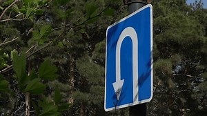 clip-1102964075-road-sign-indicating-turn-back