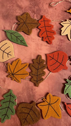 This weekend marks the official start of the autumn equinox! 🍂 So what better way to celebrate than with a very fall-inspired craft! Check out the blog today to see how I made this simple DIY felt leaf garland & download the free printable leaf templates 🍁 entertainidea.com #entertaintheidea #easydiydecor #diy #crafttok #fallcrafting #autumndecor #falldecorating