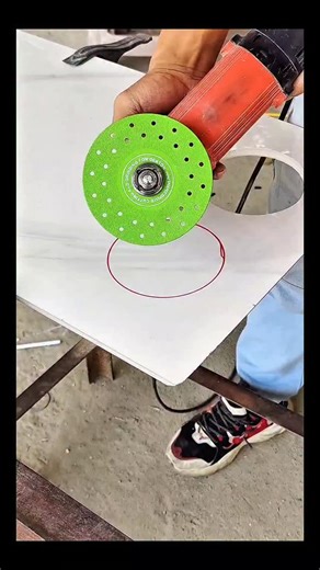 Real Engineerings | Engineering & Technology & Gadgets & DIY on Instagram: "Manual Precision: Cutting Perfect Circles in Porcelain! 📐✨ ​Observe the steady hand and skill required to cut a flawless circular opening in a large-format tile using only a handheld angle grinder. While CNC machines handle factory cuts, this is master-level onsite fabrication! ​The Art of Freehand Fabrication ​Cutting curves in brittle materials like ceramic or porcelain requires patience and the right technique to avo