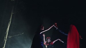 Witches dancing in circle at night