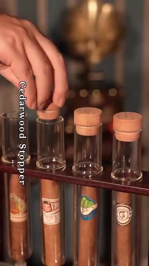 🚬 Cigar Flavor Injector Humidifier – Elevate Your Cigar Experience! 🎁✨ Indulge in the luxury of perfectly infused cigars with our Cigar Flavor Infuser & Humidor Box—a stunning blend of craftsmanship and innovation! Infuse rich aromas like rum, whiskey, vanilla, or honey and maintain ideal humidity for a mini-aging experience—all in one beautiful display. 🍯🍂 ✨ Why It’s a Must-Have: Innovative Flavor Infusion: Unlock new dimensions of flavor! 🍷 Using a borosilicate glass tube and fragrance ba