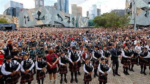 World's largest bagpipe ensemble pays tribute to Bon Scott in Australia