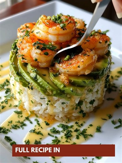 Garlic Shrimp Avocado Rice Stack 🥑🦐 A next-level dinner idea packed with bold flavor and creamy vibes! 📝 Ingredients : For the Stack: 2 cups cooked jasmine or sushi rice 1 ripe avocado, sliced 1 tbsp fresh parsley or cilantro, chopped For the Garlic Shrimp: 1 lb large shrimp, peeled & deveined 2 tbsp olive oil 3 cloves garlic, minced Juice of ½ lime ½ tsp smoked paprika Salt & pepper to taste For the Drizzle Sauce: 2 tbsp melted butter 1 tbsp lime juice 1 tsp chopped parsley Optional: dash of
