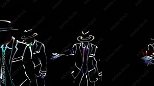 LED show in a nightclub. Impressive dances of young people, glowing in the dark with LED lighting.