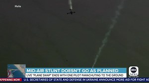 AIR STUNT GONE AWRY: One of two pilots attempting to swap planes in midair was forced to deploy their parachute after their plane began to spiral out of control. Our Will Ganss has the details. | World News Now