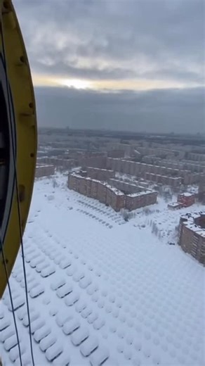 Anatolii Marynyuk on Instagram: "The footage is filmed from an aircraft assisting with rescue efforts. Below, roads and streets are covered in foam, and people are waiting on rooftops to stay above the overflow. From the air, the operation unfolds as responders work to bring individuals to safety. The scene shows a coordinated effort viewed from above. This text and video are entirely fictional and created using artificial intelligence."
