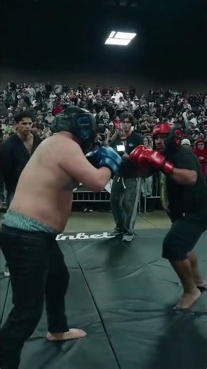 Intense Boxing Match: Unstoppable Fighters, Roaring Crowd! #shorts