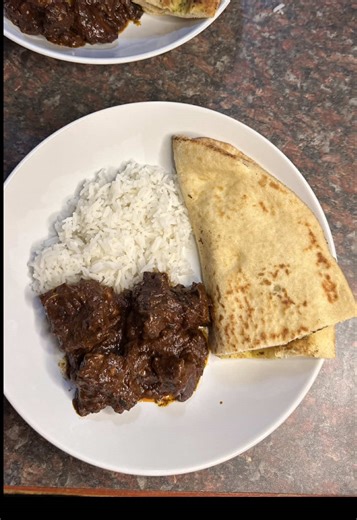 Delicious Mutton Stew with Garlic Naan and Basmati Rice