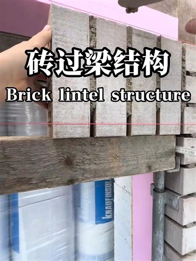 The finished brick lintel constructed by German workers, a traditional skill relying entirely on mechanics without any support. #WallBuilding #BrickLaying #BrickLintel #Bricklayer #ConstructionSiteFootage