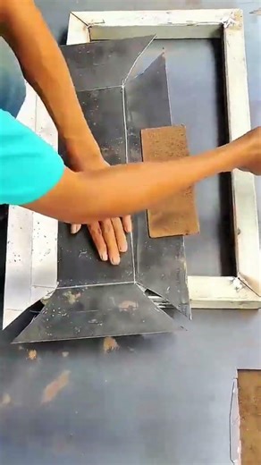 Hammering bent metal sheet into precise angular form