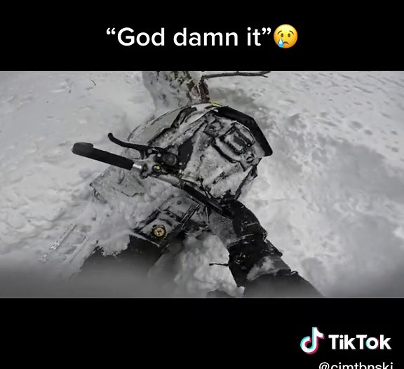 Snowmobile Crash in Deep Powder