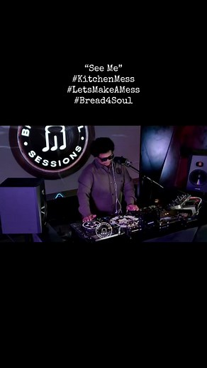DJ Mixing at Bread 4 Soul Sessions in Vibrant Atmosphere