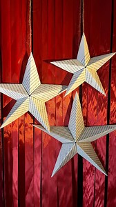 Turn old book pages into these eco-friendly DIY Christmas ornaments 🍃 ✨ Learn how to make 3D paper stars to add to your mantle ⭐️ Hang some with red ribbon for quick and easy holiday decorating idea Comment STARS for instructions & supplies #diyornaments #christmasdecor #papercraft #holidays #cozylittlechristmas crafts | DIY Joy