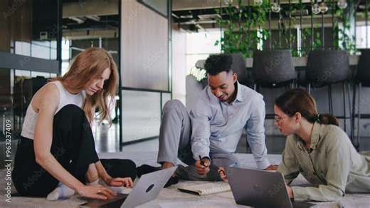 Collaborative Teamwork in a Modern Office Setting Engaged Professionals Actively Brainstorming and Sharing Innovative Ideas to Drive Success and Foster Growth Together as a Team