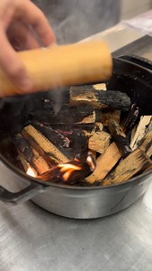 Amberjack cooked over embers, wrapped in a wood leaf and infused with whisky. Sériole cuite sur la braise, enveloppée dans une feuille de bois et imprégnée de whisky. . . #seafood #cheflife #finedining #foodart #gastronomie #seafoodlover #grilling #openfirecooking #whiskylovers #mediterraneanfood #frenchriviera | Nicolas Sintes