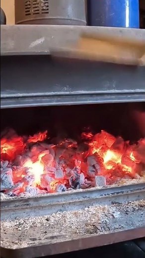 How to empty ash in wood stove while burning