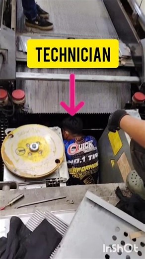 "What the technician doing inside the escalator?