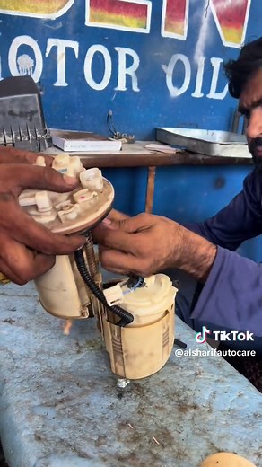How To Change Fuel Pump & Fuel Filter 03088734241 #alsharifauto #mz #shani #shortvideo #catalyticconverter #fix #avarage #Noise #toyota #advice #engine #hafizabad #fuelavarage #AC #Google #badsound #tips #tunning #Famus #Foryou #Tiktok #Million #trending #carmaintenance #workshop #injectioncleaner # liquimoly