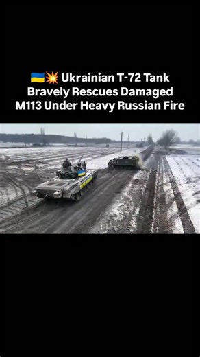 🇺🇦💥 Ukrainian T-72 Tank Bravely Rescues Damaged M113 Under Heavy Russian Fire Drone footage captures a Ukrainian T-72 tank maneuvering under intense fire to assist a damaged M113 armored vehicle. Despite dense Russian attacks, all crew members from both vehicles survived the close-call engagement. A tense moment of combat teamwork and survival on the front lines. #Ukraine #T72 #M113 #RescueMission #CombatFootage #RussianAggression #Military #Survival #WarInUkraine #DroneFootage #Heroes #Viral
