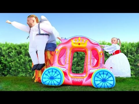 Alice is going to the ball with dad in inflatable funny costume