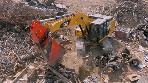 Giant machine crushing scrap metal with raw force