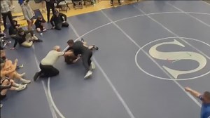 High school wrestling coach banned: 'I’ve just never seen anybody actually make it to the wrestling mat, and physically put hands on a wrestler'