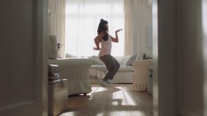 happy young woman dancing at home having fun celebrating with funny dance moves enjoying freedom on weekend morning 4k footage