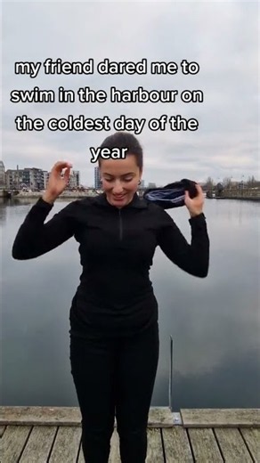 Woman swims in the harbor on the coldest day of the year!