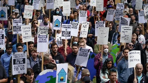 Corporate Amazon workers protest company’s climate impact and return-to-office mandate in walkout