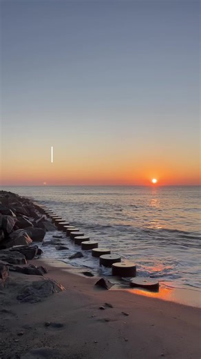 Enjoying Sunrise with Waves and a Kindle