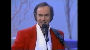 On this day in Music History - November 27, 1992 Neil Diamond's Christmas Special debuts on HBO. The one-hour show featured Neil Diamond performing many of the favorites heard on "The Christmas Album" while joined by such diverse vocal ensembles as a doo-wop group, a children's choir and a mixed chorale. Our favorite part of the following video is Ronnie Tutt on drums The LP became a Top 10, Platinum best-seller. | Johnny Rock and Roll Radio