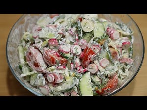 A simple and healthy salad with radishes, tomatoes and chicory
