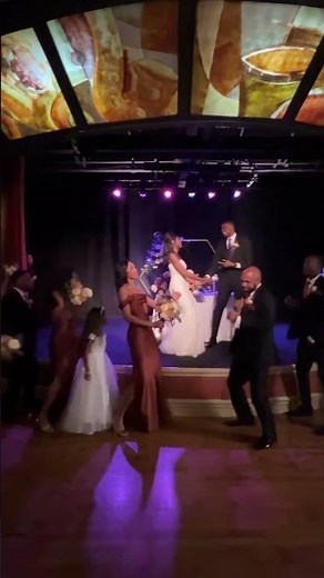 Bride & Groom wedding reception entrance song dance with bridal party