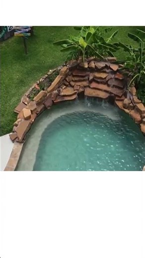 Drone Tour | Freeform Pool with Grotto, Barstools & Sunshelf