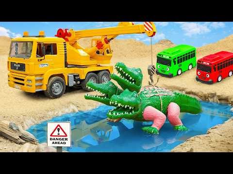 Crane Truck and Excavator Working Together to Lift Heavy Rocks