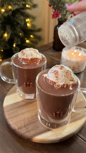 Delaney & Shelby on Instagram: "Comment “recipe” and we will send you the link directly to your inbox! Tis’ the season for homemade hot cocoa ❤️☕️🕯 #homemadehotchocolate #hotcocoa #hotchocolate #homemadehotcocoa #thickhotchocolate cozydrinks winterdrinks yessidothecookingg ✨subscribe to our website to access all of our recipes, 70+ of your other fav food creator’s recipes, meal planning features, grocery lists, and more! Or sign up for a 7 day free trial to check it out without any commitment.