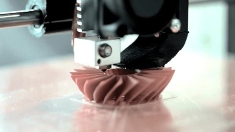 clip-3934347559-printing-creation-form-by-3d-printer-machine
