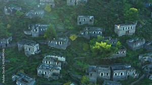 Old ruins of abandoned greek village Kayakoy. Famous destination near Fethiye in Turkiye. Famous ghost town. Aerial panoramic view