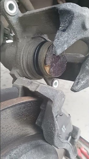 How to push in Ford brake piston