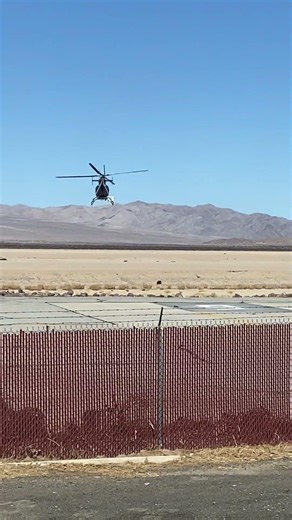 Bell 407 helicopter lifting off