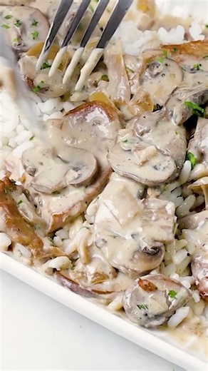 Creamy Pork Tenderloin and Mushrooms Over Rice