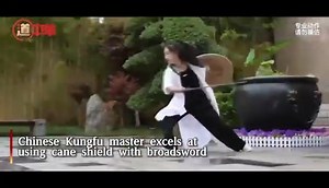 Attack and defense! Chinese #Kungfu master excels at using a cane shield with a broadsword. #martialarts #wushu #girlpower | All about Martial Arts