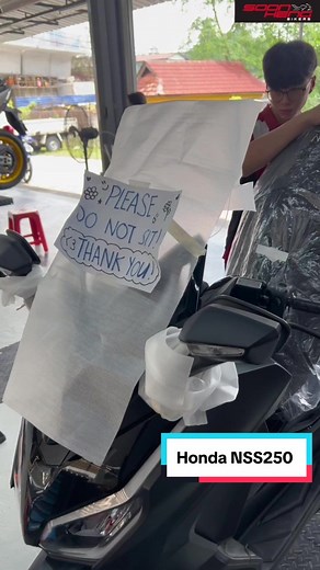 Installing Phone Holder on Honda NSS250 for Easy Navigation