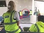 Baggage handlers at Edinburgh Airport throw bags onto carousel | Daily Mail Online