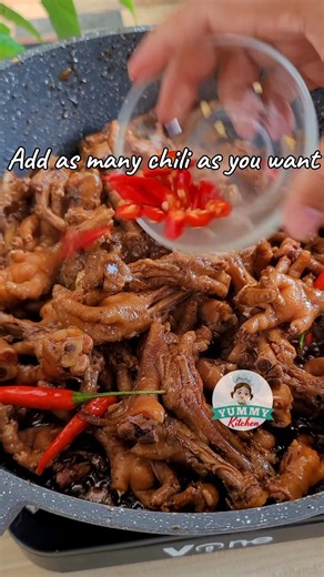 Adobong Paa ng Manok is a Filipino dish made by cooking chicken feet (paa ng manok) using the traditional adobo method. "Adobo" is a popular Filipino cooking style where meat is simmered in vinegar, soy sauce, garlic, bay leaves, and peppercorns—sometimes with onions and sugar, depending on the region or personal taste. Key Characteristics of Adobong Paa ng Manok: Main Ingredient: Chicken feet (cleaned and often pre-boiled to make them tender). Adobo Sauce: A savory-sour blend made of: Soy sauce