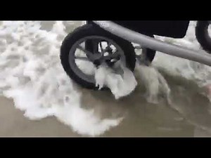 Outdoor walker Trionic Veloped on wet beach sand