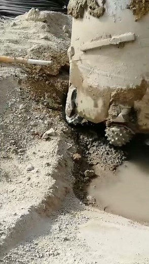 Piling work, drilling through hard rock from ground level, using roller bit core barrel, 800mm dia.